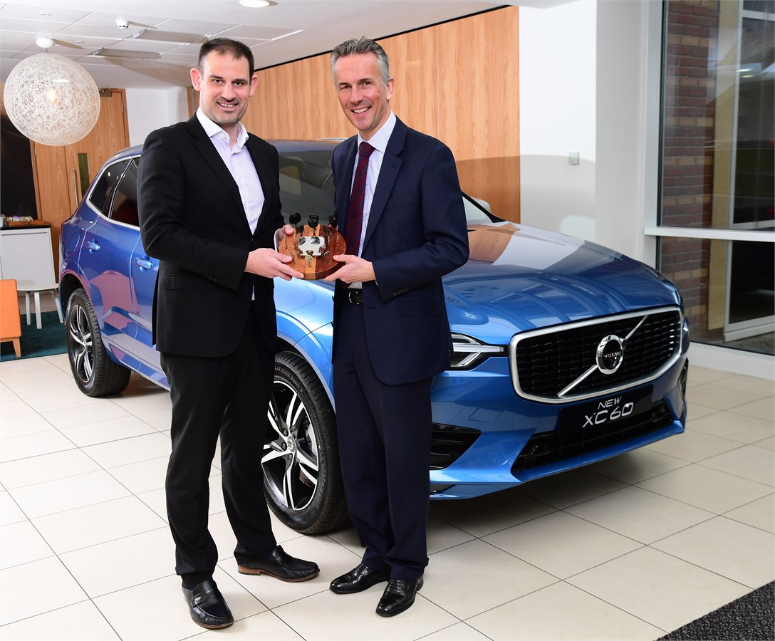 Jon Wakefield, MD of Volvo Car UK, (right) receiving the UK Car of the Year Award 2018 for the XC60