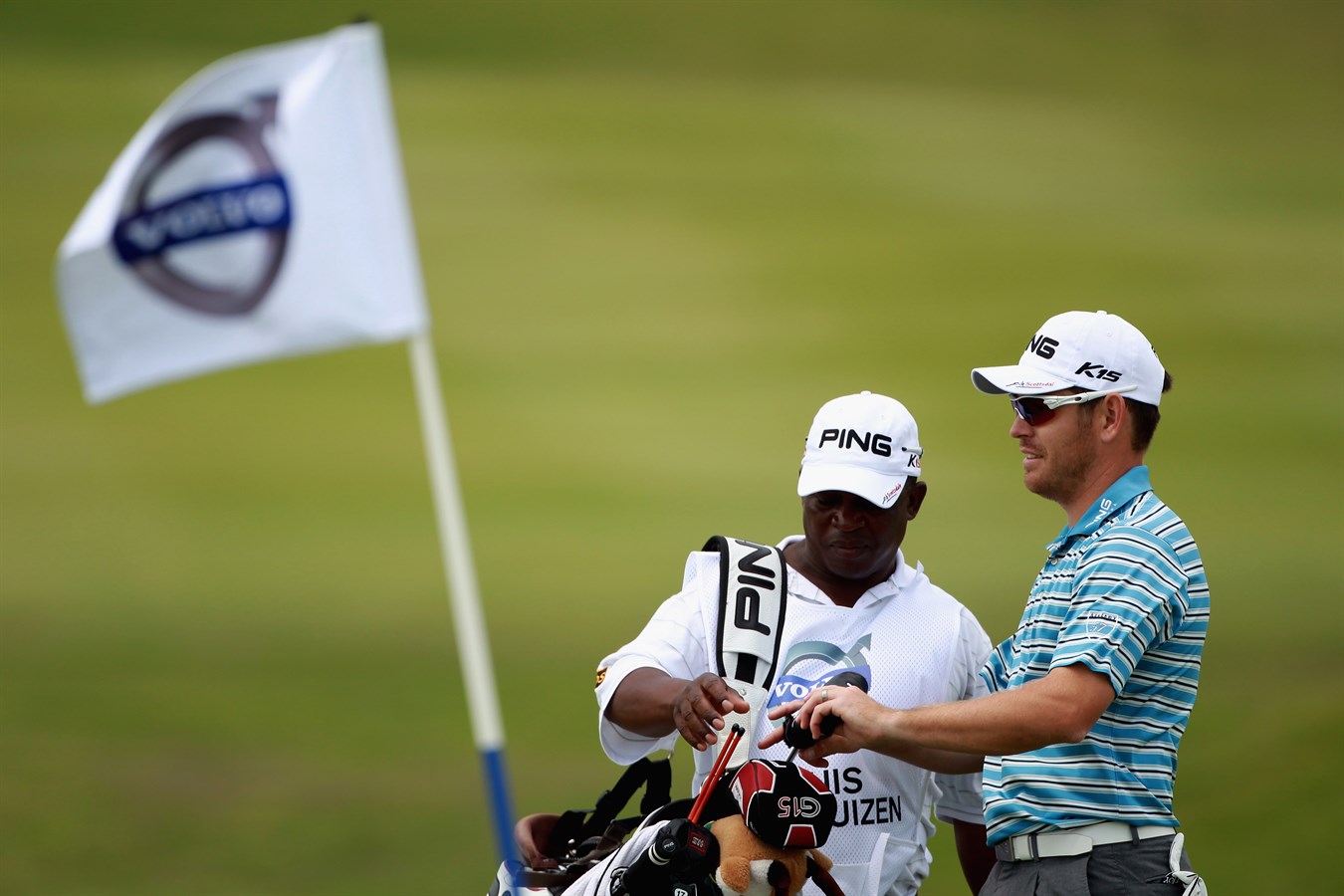 Louis Oosthuizen (pictured with his caddy) Volvo in Golf