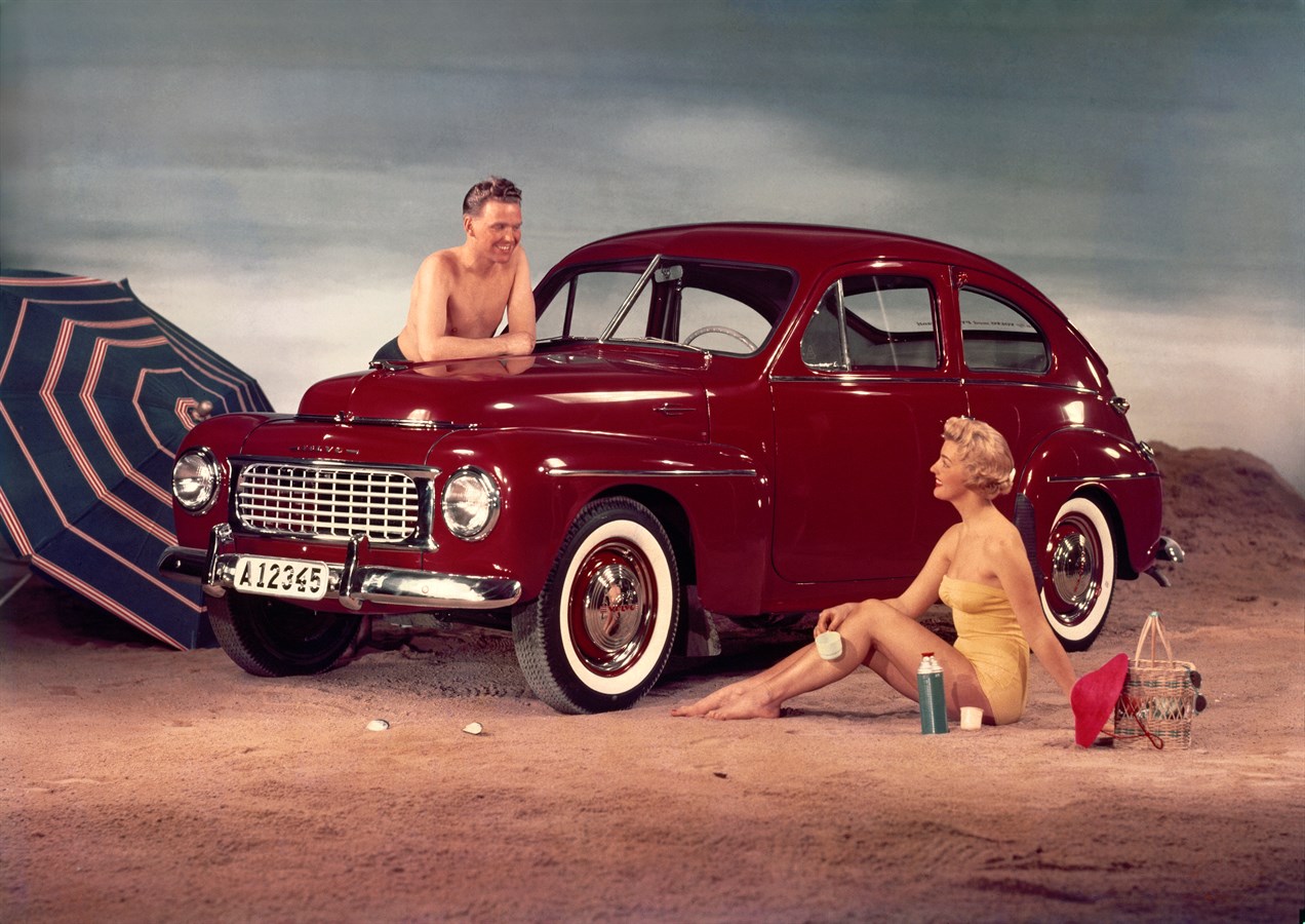 PV444 S, 1956. The sun, the sea and a brand new Volvo. From an advertisement.