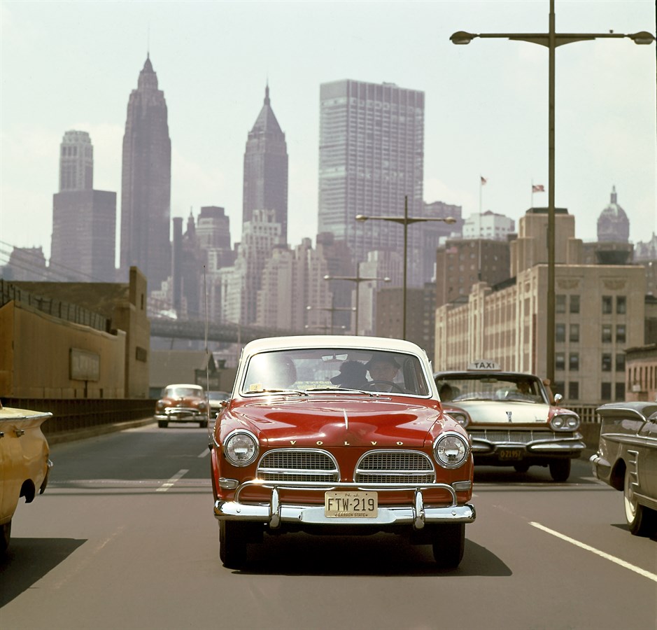 122, USA, 1958. A Swede in New York. A 1958 Volvo 122 "Amazon" caught in the middle of Manhattan traffic.