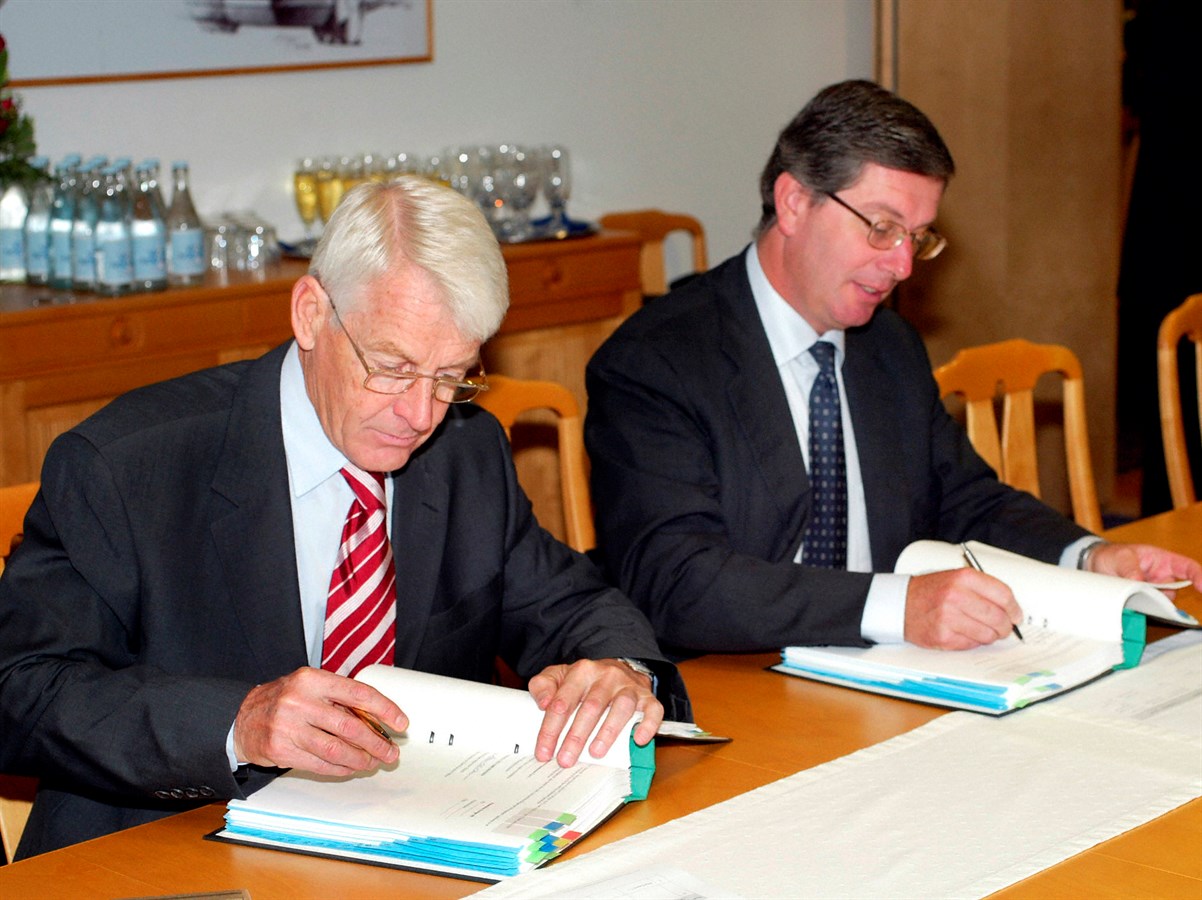 Hans-Olov Olsson CEO and President, Volvo Car Corporation (2000-30 Sept 2005) and Andrea Pininfarina CEO, Pininfarina SpA are signing the agreement with the aim to develop and manufacture Volvo's next generation convertible.  The name of the new company i