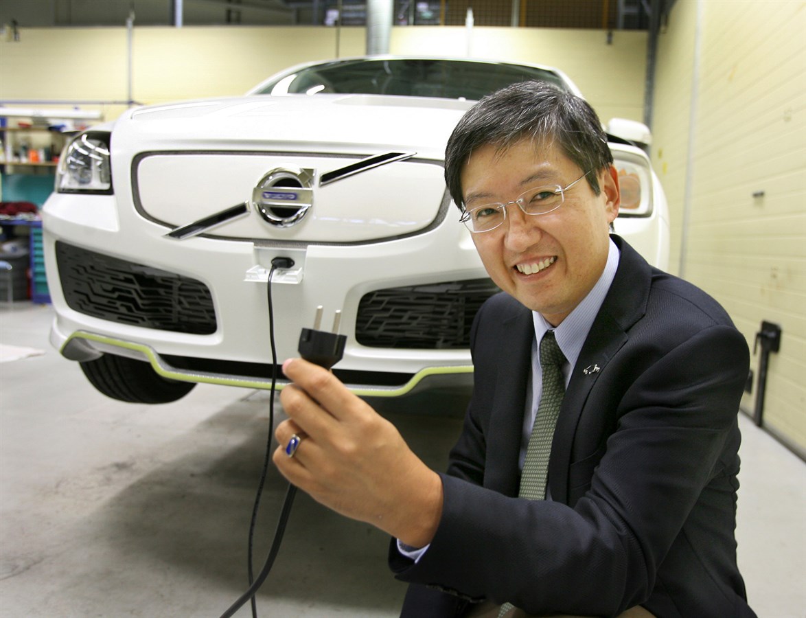 Ichiro Sugioka, project manager for the Volvo ReCharge Concept, in front of the ReCharge Concept car